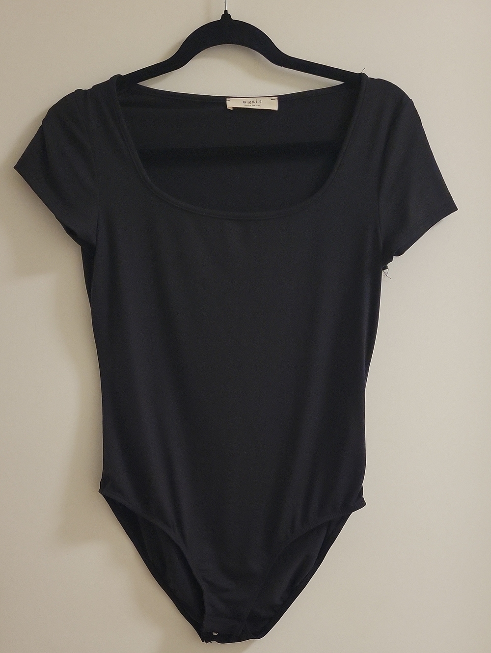 A. Gain Black Scoop Neck Short Sleeve Bodysuit